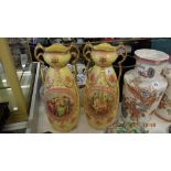 A pair of late 19th century painted decorative vases