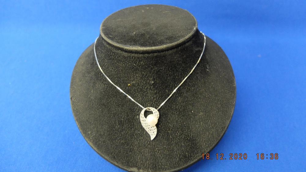 A 9ct white gold diamond pearl set pendant on chain - Image 6 of 7