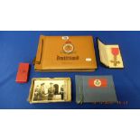 A collection of war memorabilia; OBE medal, Coronation medal, photographs inc Rommel and Montgomery,