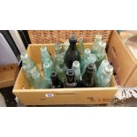 A box of assorted bottles