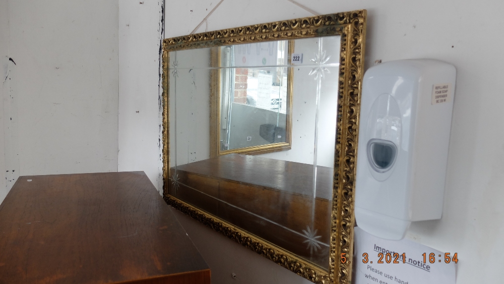 A gilt framed mirror,