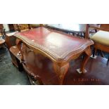 A leather topped coffee table