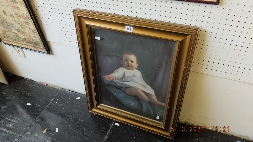 A portrait of a child framed