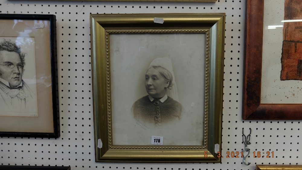 A framed portrait on glass, signed by Friese Greens and Simpson,