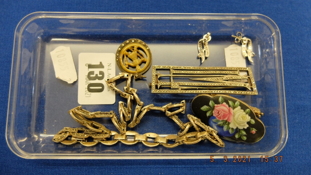 Six assorted white metal items inc. necklace, brooches etc.