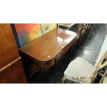 A 19th century Mahogany fold over tea table