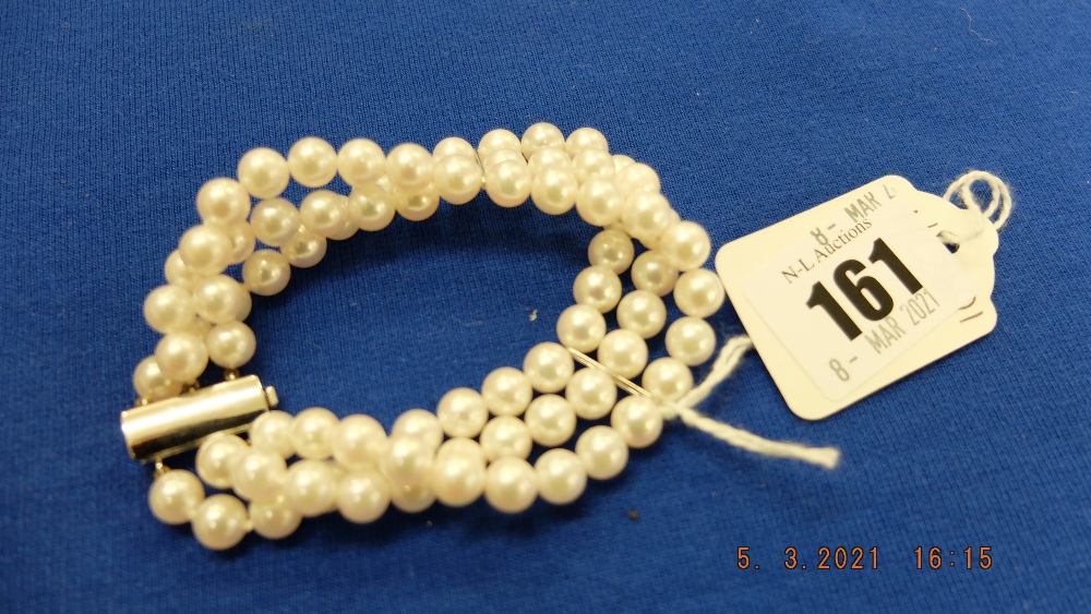 A three row cultured pearl bracelet, 7mm pearl,