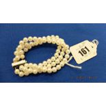 A three row cultured pearl bracelet, 7mm pearl,