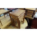 An oriental nest of three tables