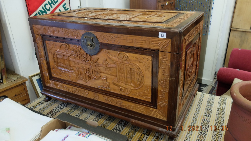 A Chinese Camphor wood carved chest