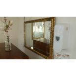 A gilt framed mirror,