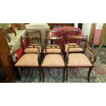 A set of six Regency style chairs plus two carvers