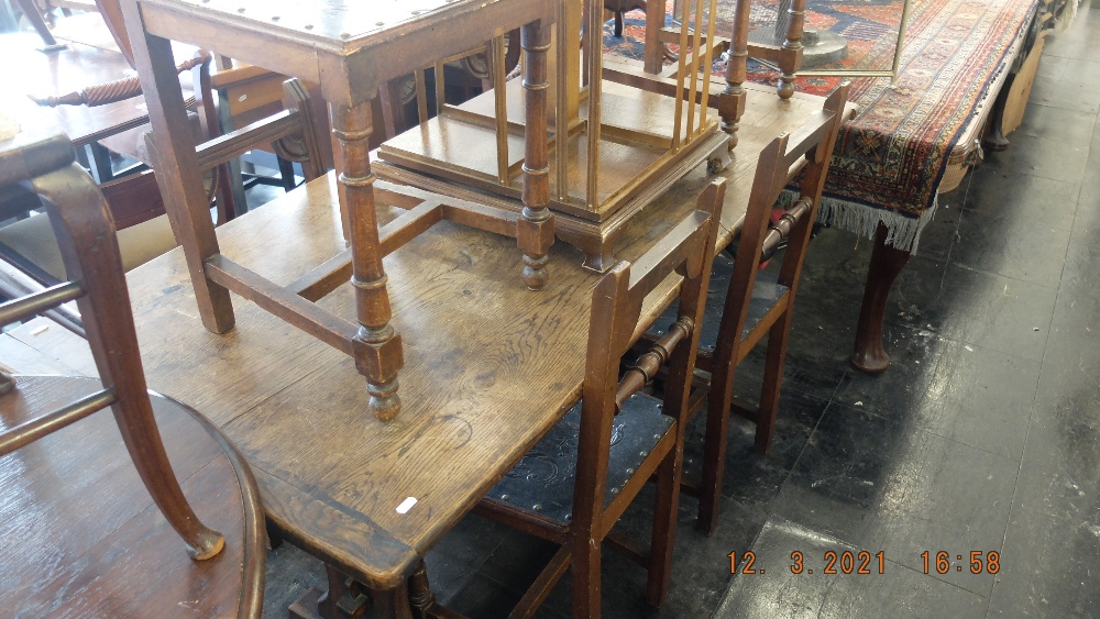 An oak table and six chairs