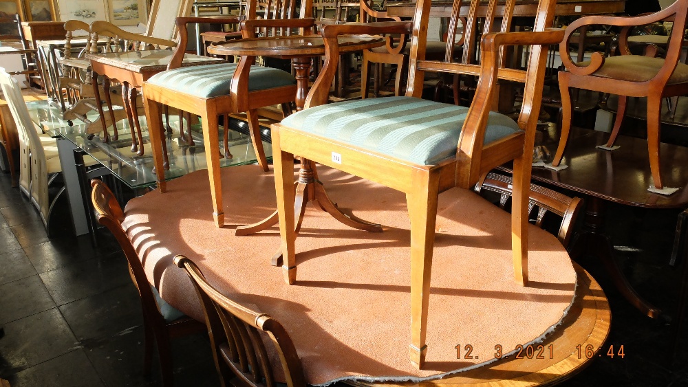 A regency style table and chairs