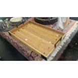 A wooden contemporary serving tray