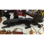 A bronze stylized Panther