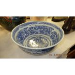 A large oriental blue and white bowl