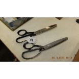 Two pairs of dress makers scissors