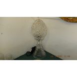 A very heavy cut glass table lamp,