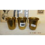 Three brass Kiddush cups