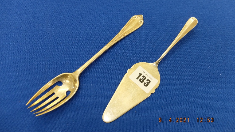 A hallmarked Silver cake slice and a unusual pickle fork, total weight for lot 3.