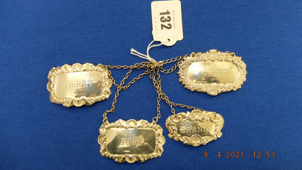 Four hallmarked silver decanter labels