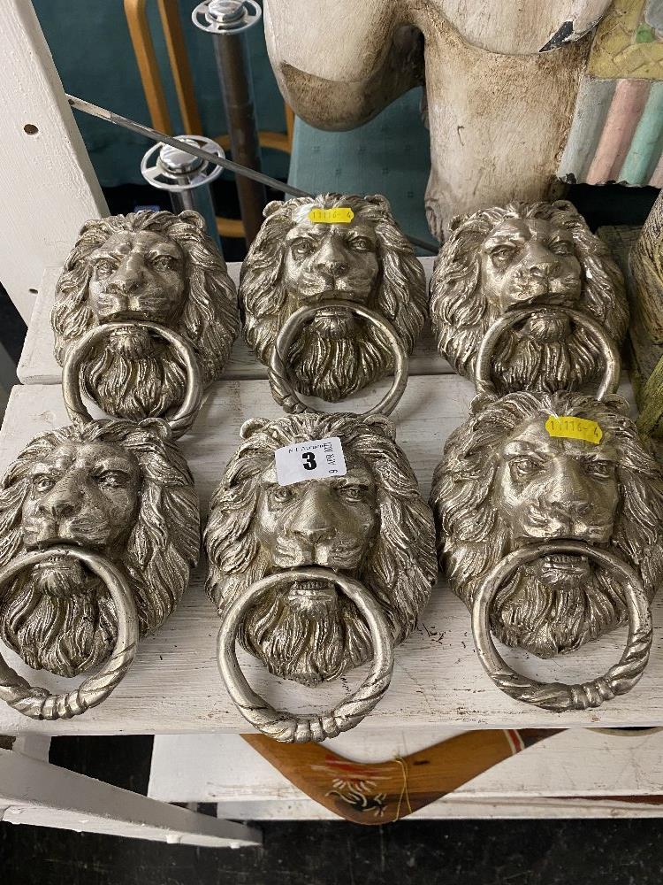 Silvered Lion door knockers,