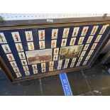 A framed military cigarette cards