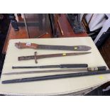 A sword stick, WW1 bayonet, machete etc.