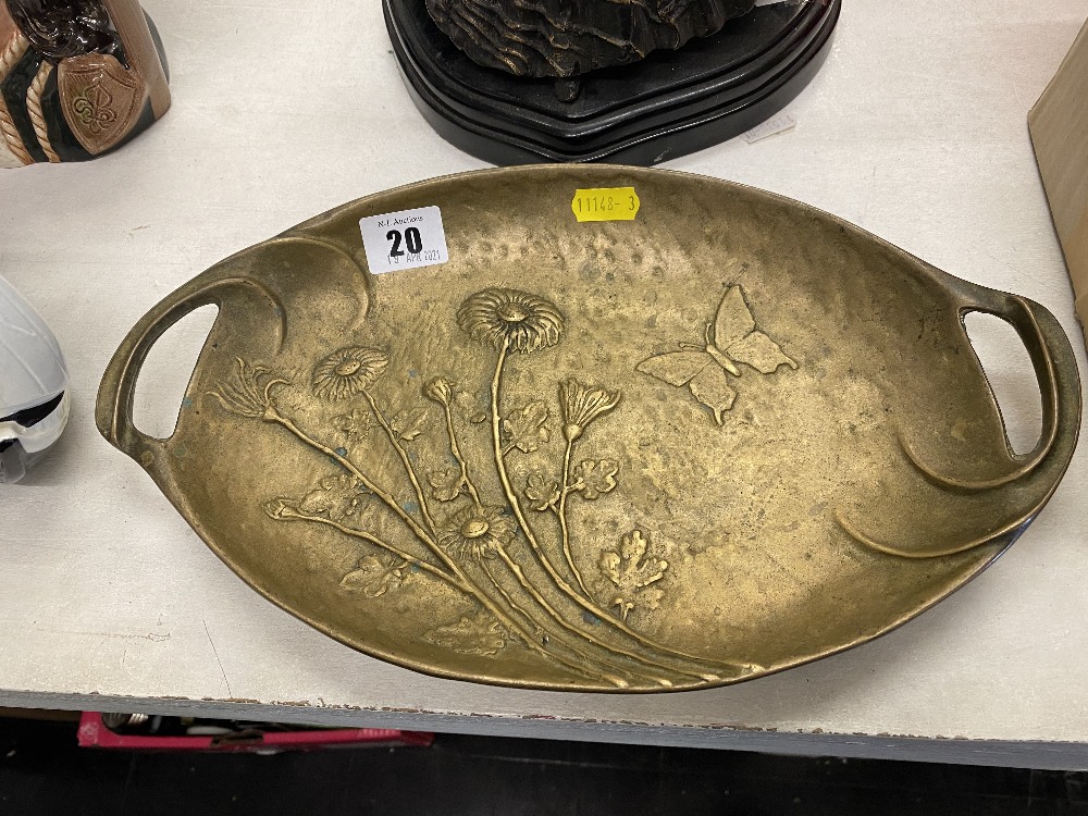 An Art nouveau brass two handled dish