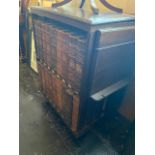 A bookcase with Britiania encyclopedias,