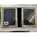 A hallmarked Silver double photo frame