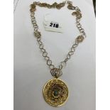 An 18ct Gold chain and pendant