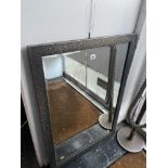 A metal framed mirror