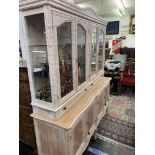 A shabby chic bookcase on cupboard base