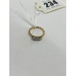 An 18ct gold three stone Diamond ring