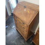 An inlaid mahogany bureau