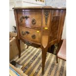 An inlaid French chest of drawers with Ormulu mounts
