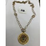 An 9ct Gold chain 76cms length and 18ct gold pendant