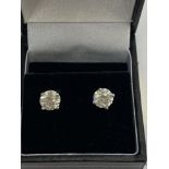 A pair of White Gold Diamond stud earrings, 2.
