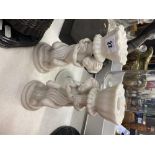 A pair of marble Cherub candlesticks