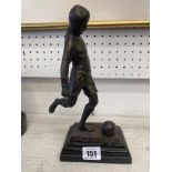 A bronze footballer,