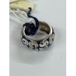 An 18ct White gold enamel and Diamond ring