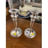 A pair of hallmarked silver candlesticks