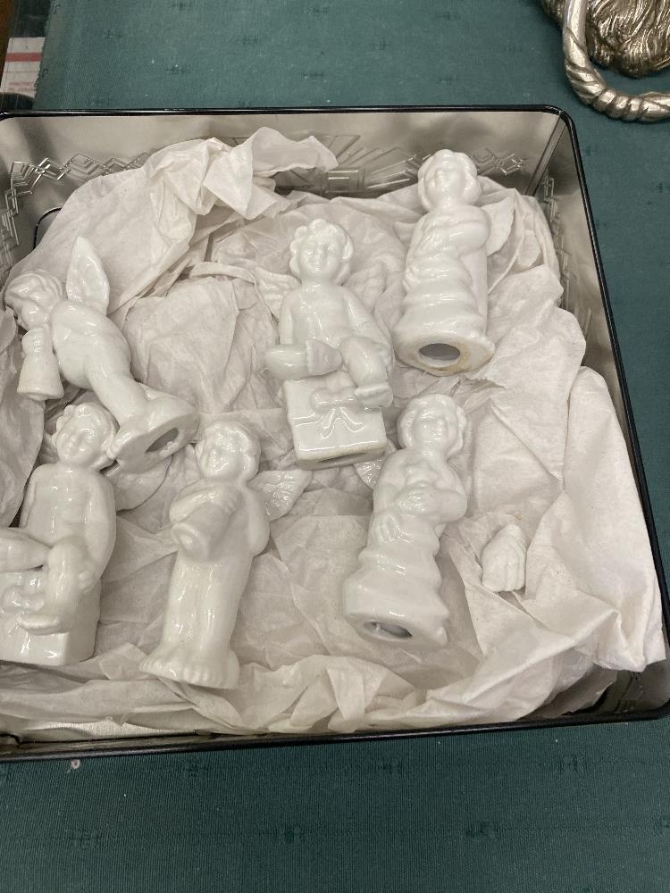 A collection of china cherubs