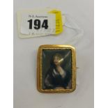 A miniature portrait of a woman on porcelain in 18ct gold frame,