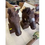A pair of iron Horse heads