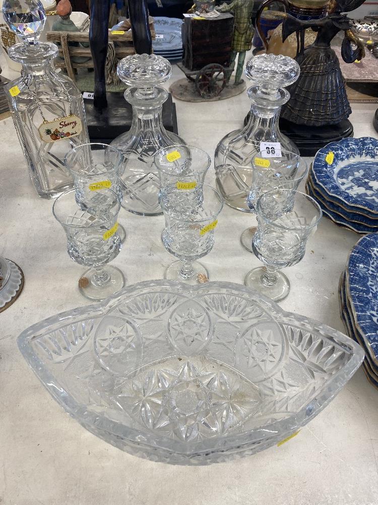 A qty of decanters, cut glass bowl etc.