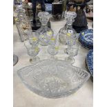 A qty of decanters, cut glass bowl etc.