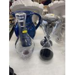 A hour glass, blue jug, black vase etc.